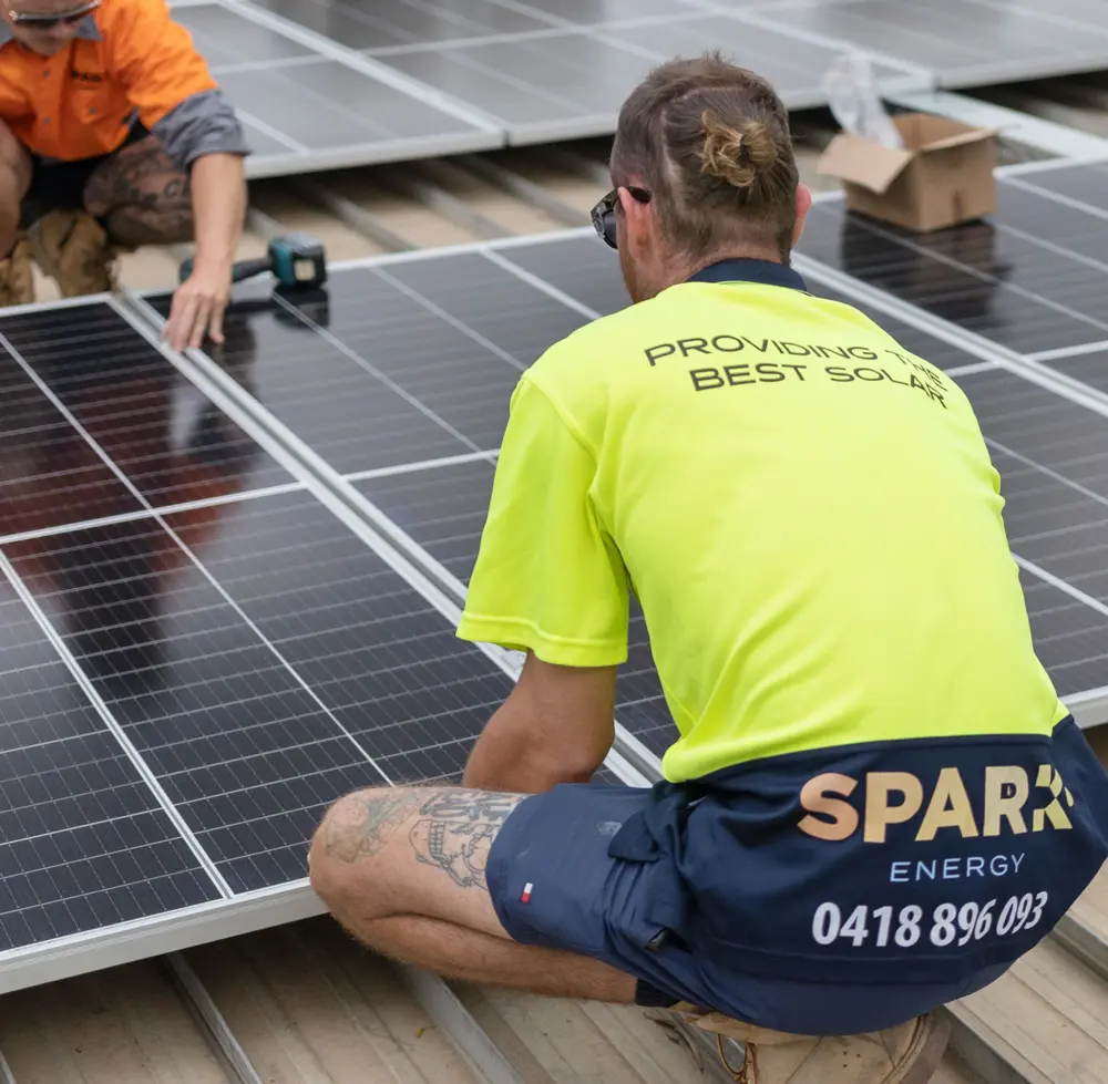 Spark Energy tradesmen installing solar panels